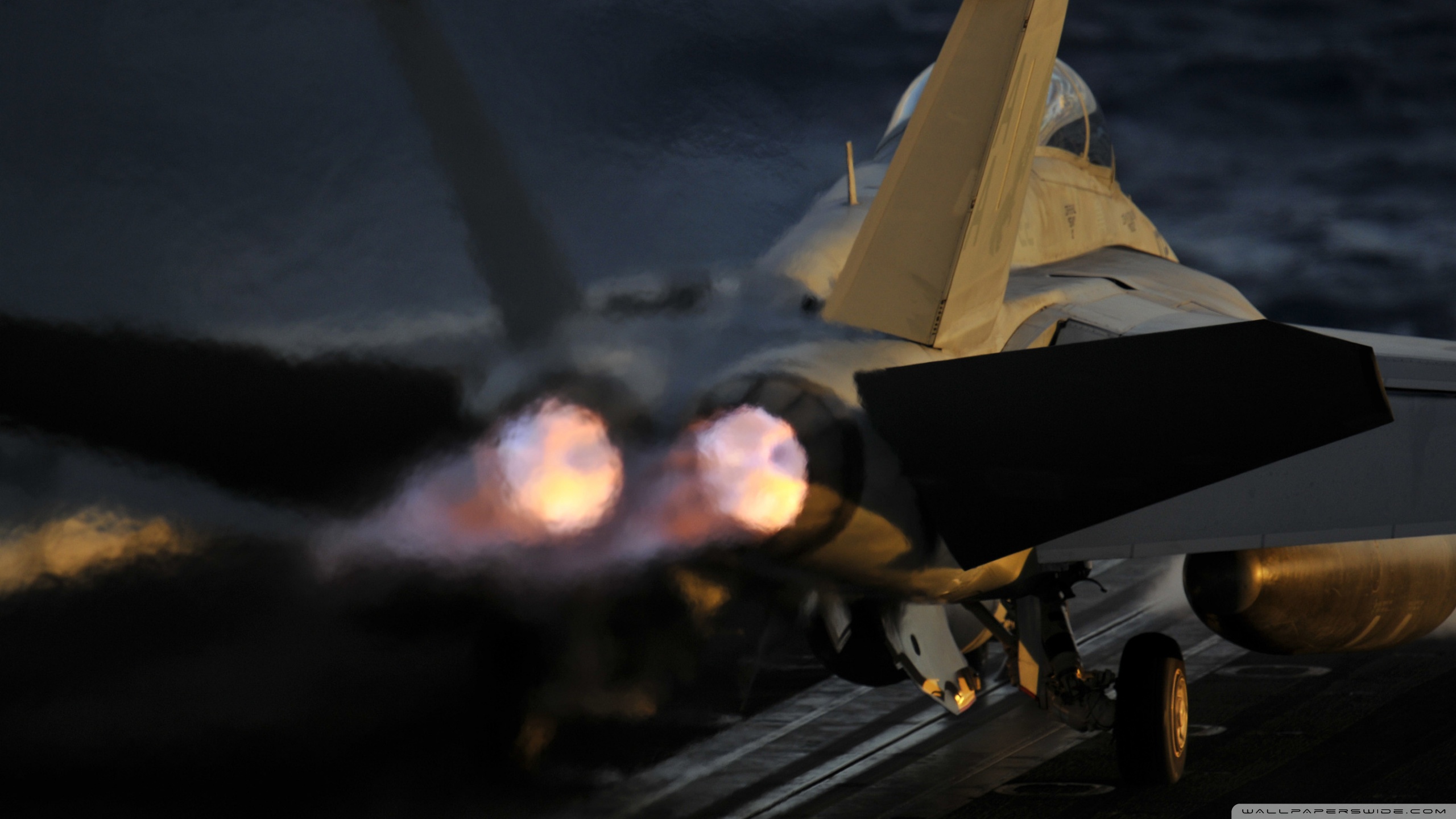 a_jet_launches_from_the_flight_deck-wallpaper-2560x1440.jpg